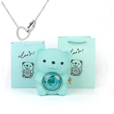 Urso Rotativo com Colar Dois Corações